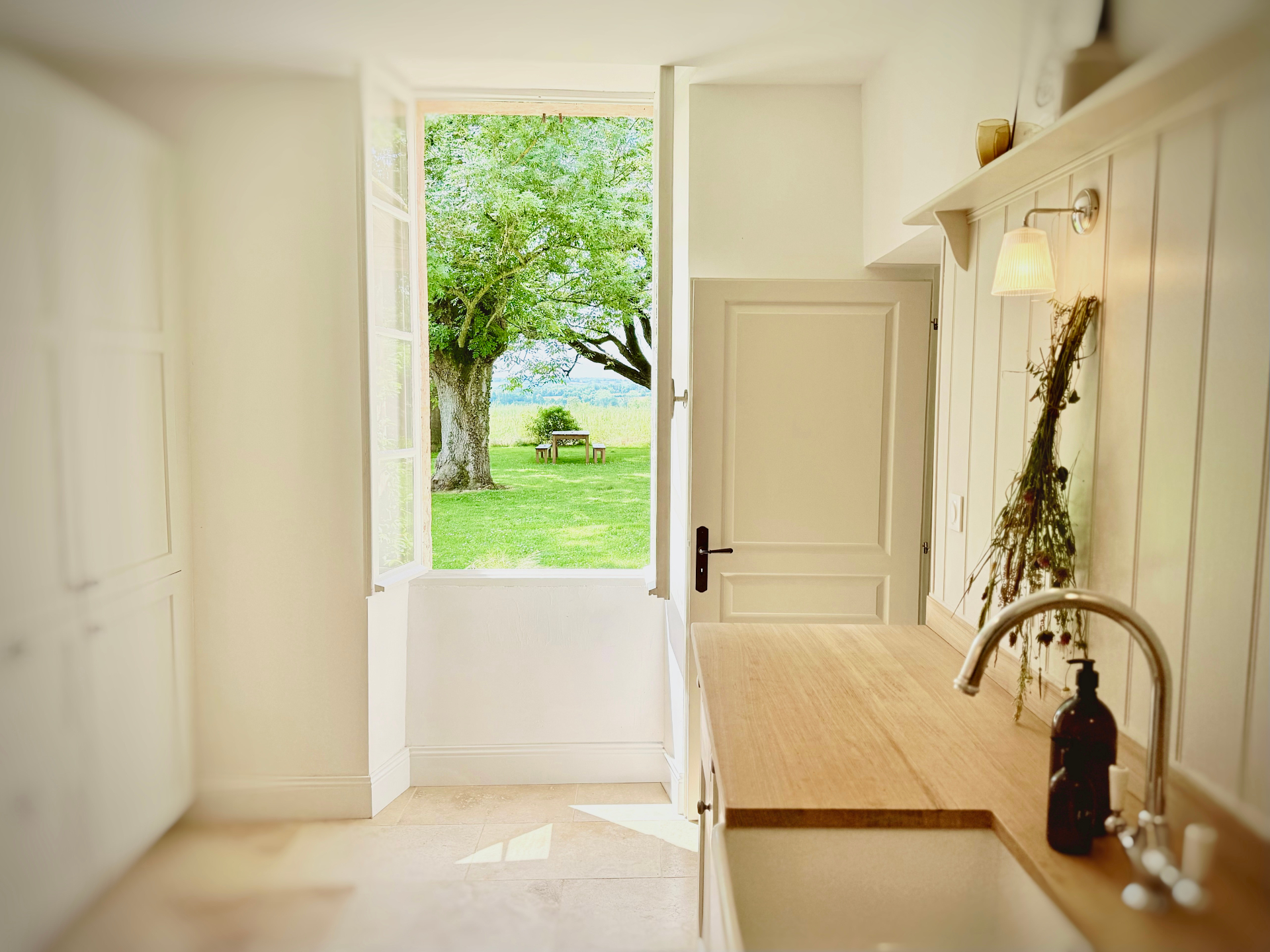 View through farmhouse door to garden